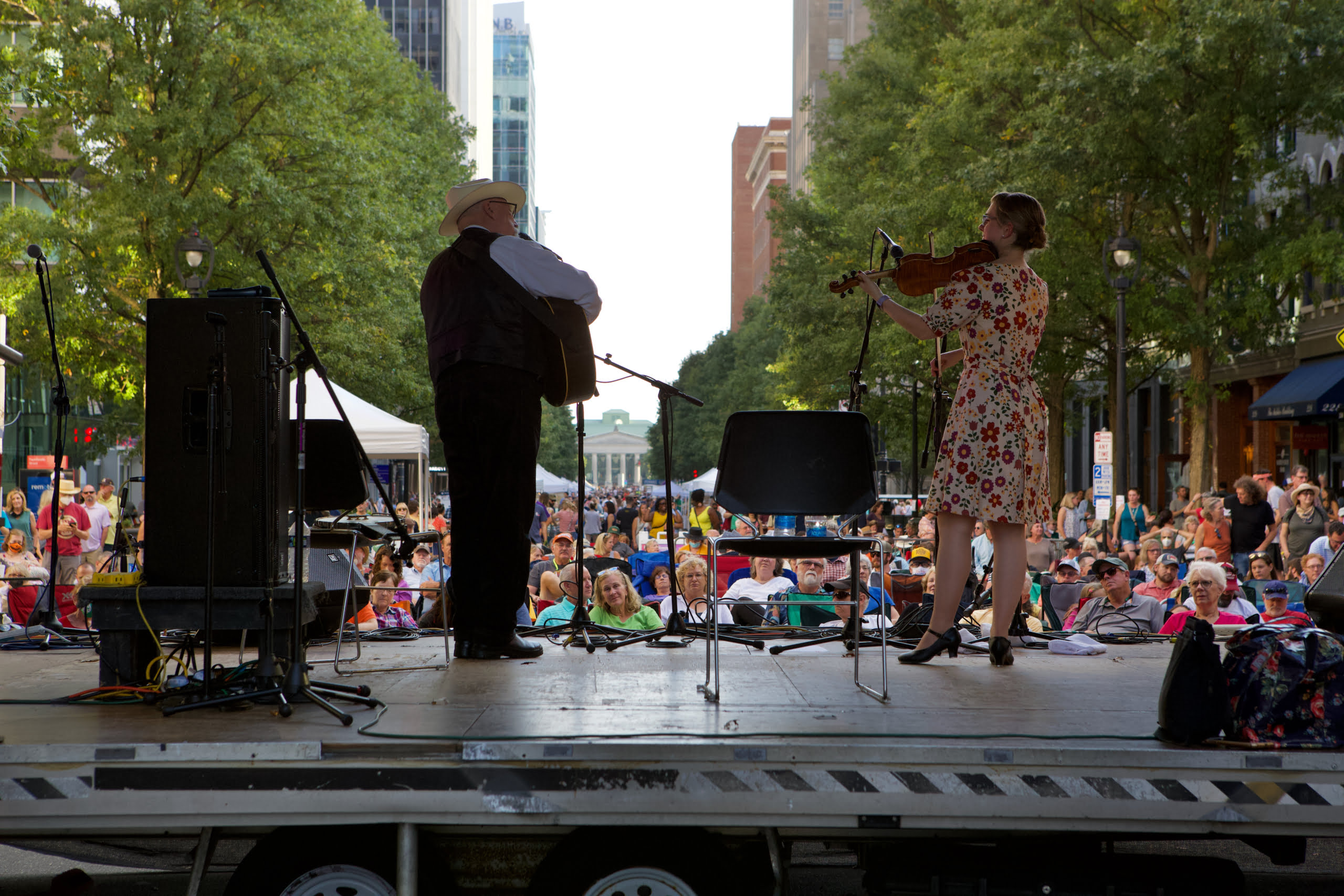 Joe Newberry and April Verch performing at the Wide Open Bluegrass Festival in 2019. The event caps off IBMA's World of Bluegrass and that year drew more than 200,000 people downtown.